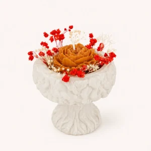 Bougie fleur rose caramel — coupe sur pied cannelée