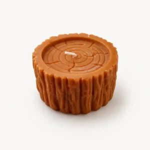 Bougie imitant une tranche de rondin de bois couleur caramel
