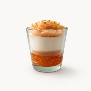 Bougie en verre effet dessert gelée surmontée d'une rose orangée