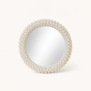 Miroir rond orné de perles