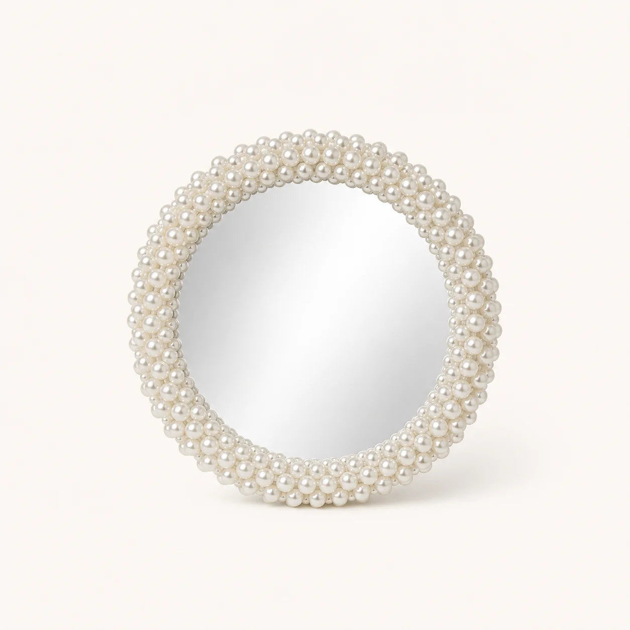 Miroir rond orné de perles