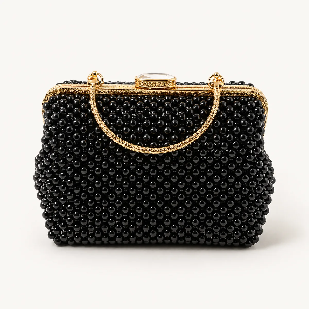 Sac perles noires — cadre et anse plaqués or