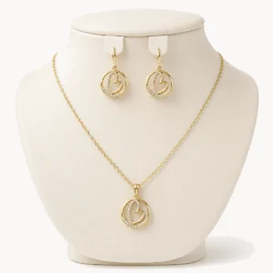 Parure collier et boucles à motif cœur en cristaux, doré