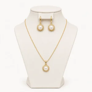 Parure collier et boucles à pendentif soleil doré et perle nacrée