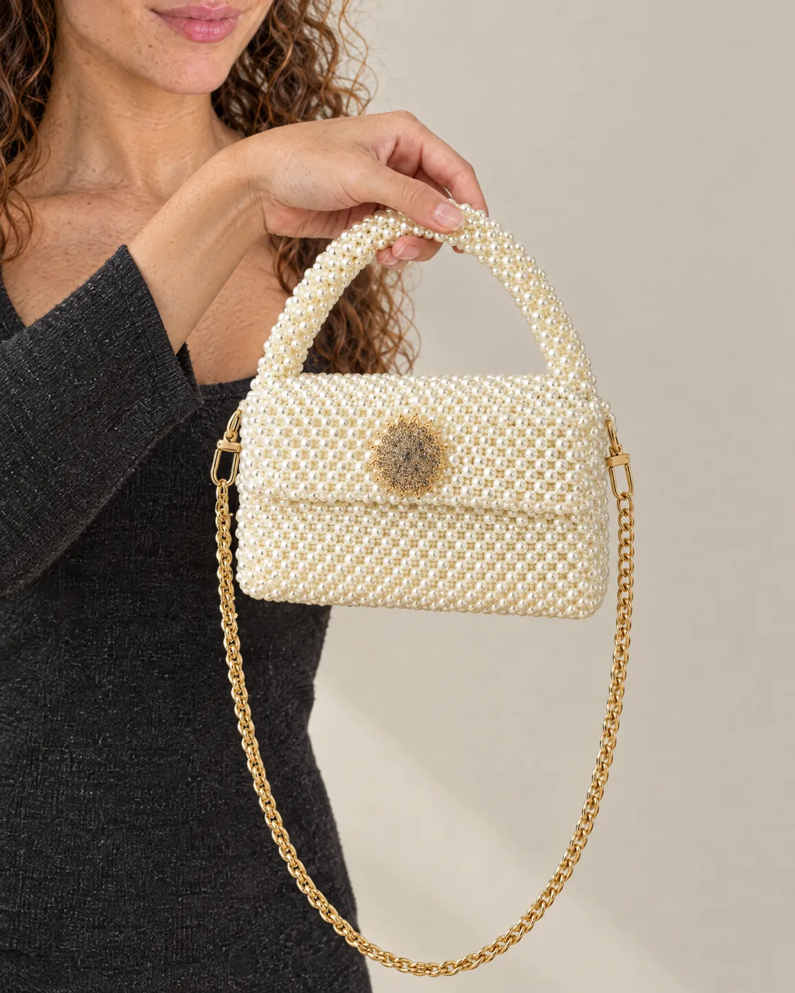 Sac en perles blanches — en main, pour la taille
