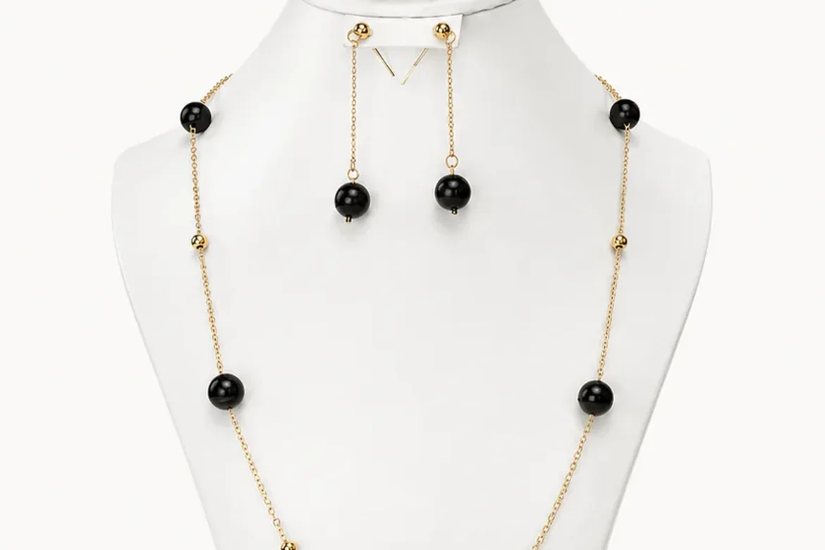 Parure noir & or — détail