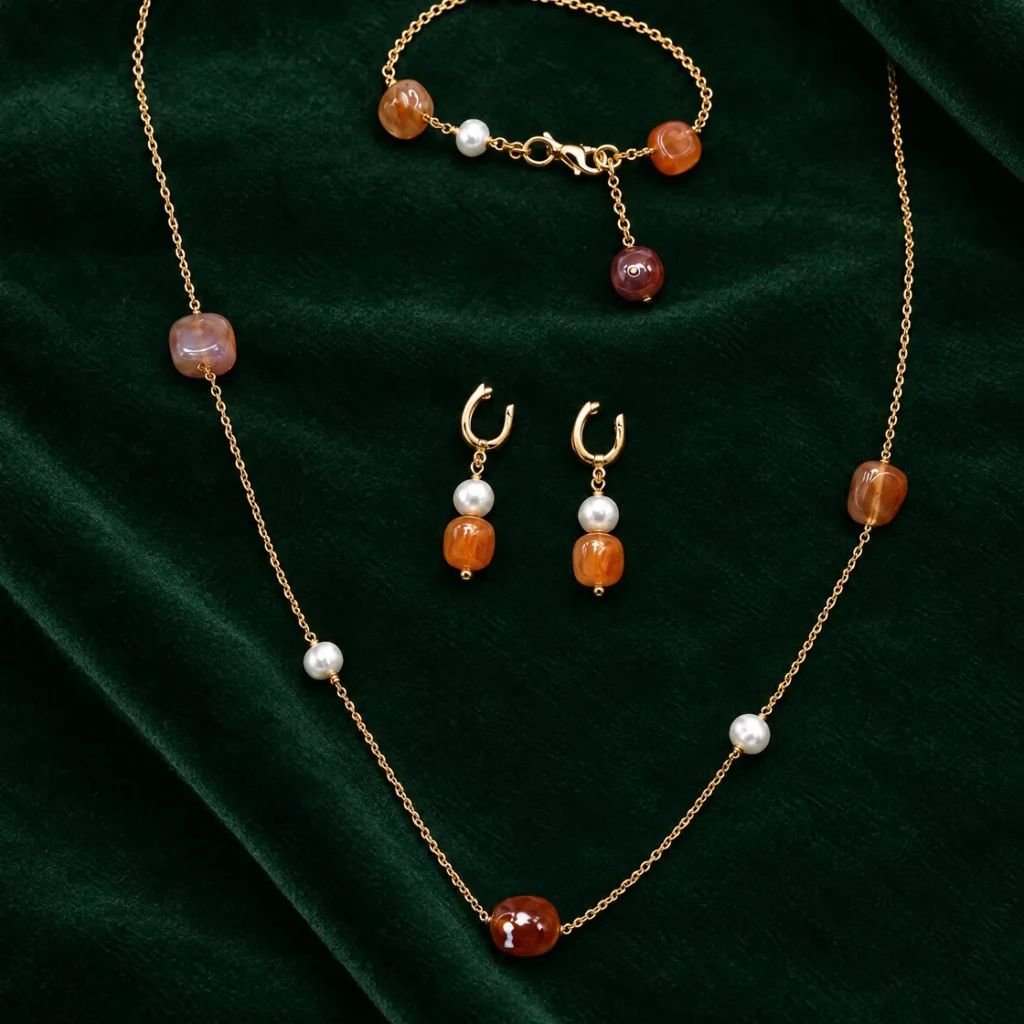 Amber-tone stone & cultured pearl set — on velvet